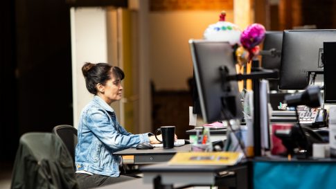 woman working on her desk space